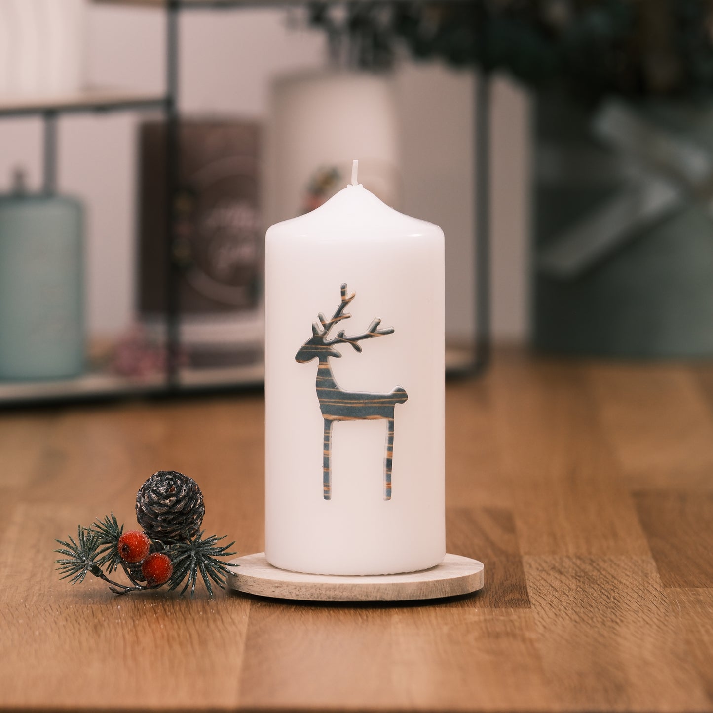 Weihnachtskerze mit Hirschen